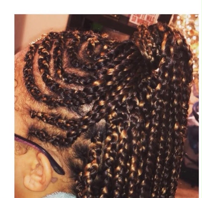 Feed-in braids swirl design, close-up