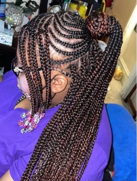 Swirl feed-in braids with ponytail, side view