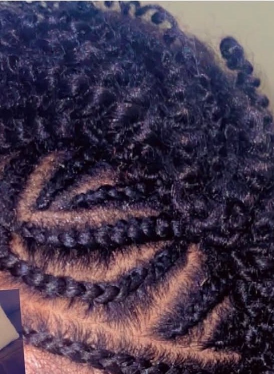 Kinky twists with cornrow design, close-up